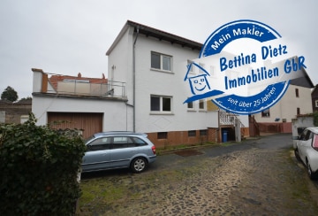 DIETZ: Einfamilienhaus mit großer Dachterrasse, Garage und Keller!, 64807 Dieburg, Einfamilienhaus