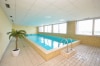 DIETZ: 4-Zimmer-Wohnung mit Schwimmbad, Sauna, T-Garage, EBK uvm.! - Gemeinschaftliches Schwimmbad