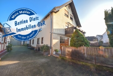 DIETZ: Provisionsfreie Erdgeschosswohnung mit eigenem Garten, großer Garage und Kellerraum in Harpertshausen!, 64832 Babenhausen, Terrassenwohnung