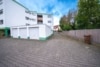 DIETZ: Helle 3-Zimmer ETW mit 2 Bädern - Balkon - EBK und Garage in Rödermark-Messenhausen! - Garagenzufahrt
