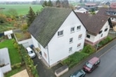 DIETZ: 3 Familienhaus mit 1 Zimmerwohnraum im KG + Garten und 2 Garagen in Babenhausen! - Außenansicht