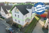 DIETZ: Große Maisonette-Eigentumswohnung mit gepflegtem Garten in Babenhausen - Sickenhofen! - Luftbild Wohnhaus