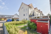 Außenansicht - DIETZ: 10200,- Jahresnettomieteinnahme Eigentumswohnung mit guter Ausstattung – Nahe Mainparksee!
