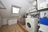 DIETZ: 3 Zimmerwohnung mit Einbauküche und 2 Balkonen in ruhiger Lage von Eppertshausen - Wasch- und Heizungsraum