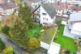 DIETZ: 4-5 Zimmer-Wohnung im ersten Obergeschoss in ruhiger Randlage von Babenhausen! - Außenansicht Garten