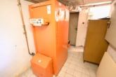 Heizungsraum KG - Vermietetes 2 Familienhaus mit Garage, Garten und Terrasse in ruhiger Wohnlage von Messel!