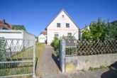 Außenansicht - Vermietetes 2 Familienhaus mit Garage, Garten und Terrasse in ruhiger Wohnlage von Messel!