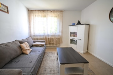 Vermietetes 2 Familienhaus mit Garage, Garten und Terrasse in ruhiger Wohnlage von Messel! - Wohnbereich EG (623693)