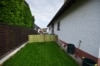 DIETZ: Schön Wohnen im freistehenden Bungalow mit Garage und tollem Garten! - Weitere Haus-Gartenansicht