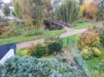 DIETZ: Familienfreundliches Reihenmittelhaus mit Garage und Garten in beliebter Lage von Babenhausen - Blick über den Garten ins Grüne