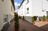 Gepflegter Innenhof - DIETZ: Einzugsbereite und renovierte 3-Zimmerwohnung im ersten Obergeschoss in Münster zu vermieten!