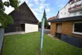 Garten - DIETZ: Geräumiges 1-2 Familienhaus mit großem Grundstück, Nebengebäude und Doppelgarage!