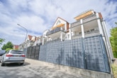 Außenansicht - DIETZ: 3-Zimmerwohnung im Erdgeschoss mit zwei TG-Stellplätzen und Kellerraum!