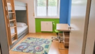 Kinderzimmer - DIETZ: 3-Zimmerwohnung im Erdgeschoss mit zwei TG-Stellplätzen und Kellerraum!