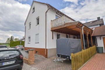 DIETZ: Gepflegte 3-Zimmerwohnung im 1.OG mit Balkon in Langstadt, Babenhausen nahe des Feldes! - Außenansicht (676089)