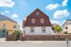 DIETZ: PREISREDUZIERUNG! Großzügiges Zweifamilienhaus in Dieburg mit Carport, Hof und viel Platz! - Außenansicht