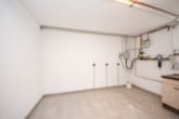 Waschküche - Neuwertige 3 Zi-Wohnung im 1. OG mit Personenaufzug, Kellerraum und 2 PKW – Stellplätzen in Messel!