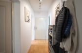 Flur - Vermietete 3-Zimmer-Eigentumswohnung im 1. Obergeschoss mit überdachtem Balkon!
