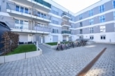 DIETZ: Moderne und helle 2-Zimmerwohnung im 1. OG mit Balkon und TG-Stellplatz! - Außenansicht