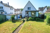 Garten - DIETZ: Modernisierungsbedürftiges Einfamilienhaus mit Garten in direkter Feldrandlage von Rollwald!