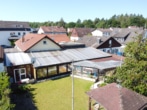 Hintere Hausansicht - Urlaubsfeeling! Haus mit Wintergarten, riesiger Schwimm- und Fitnesshalle in Neuenhasslau!
