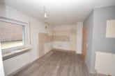 Küche mit Essbereich - DIETZ: 4-Zimmer-Wohnung – Balkon, gemeinsamer Garten, kinderfreundlich – Niedrige Energiekosten!