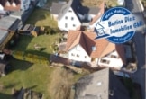 DIETZ: Sehr gepflegtes Einfamilienhaus mit wunderschönem Garten in ruhiger Lage von Ringheim! - Luftansicht