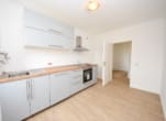 6498-lang12#Neue Einbauküche Inklusive - DIETZ: Modernisierte 2-Zimmer-Wohnung im 7. Obergeschoss mit Balkon in Bad-König! Neue Einbauküche, Kellerraum, Balkon