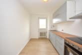 6498-lang14#Neue Einbauküche Inklusive - DIETZ: Modernisierte 2-Zimmer-Wohnung im 7. Obergeschoss mit Balkon in Bad-König! Neue Einbauküche, Kellerraum, Balkon
