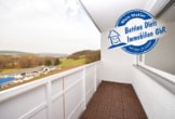Balkon - DIETZ: Modernisierte 2-Zimmer-Wohnung im 7. Obergeschoss mit Balkon in Bad-König! Neue Einbauküche, Kellerraum, Balkon