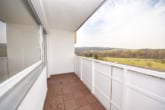 Balkon mit herrlichem Ausblick - DIETZ: Modernisierte 2-Zimmer-Wohnung im 7. Obergeschoss mit Balkon in Bad-König! Neue Einbauküche, Kellerraum, Balkon