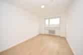 Schlafzimmer - DIETZ: Modernisierte 2-Zimmer-Wohnung im 7. Obergeschoss mit Balkon in Bad-König! Neue Einbauküche, Kellerraum, Balkon