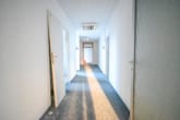 Flur 1. OG - DIETZ! Büro-, Praxis oder sonstige Gewerberäume – zentrale Lage von Babenhausen! Fitnessstudio im EG