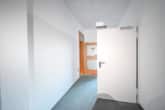 Flur 1. OG - DIETZ! Büro-, Praxis oder sonstige Gewerberäume – zentrale Lage von Babenhausen! Fitnessstudio im EG