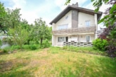 Garten - Großzügig geschnittenes Einfamilienhaus mit Doppelgarage, Garten und Terrassenkamin!