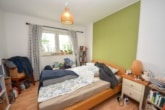 DIETZ: Frei ab 01.01.2025! Top 3 Zi. -Wohnung mit Garten, Terrasse und 2 PKW-STPL! - Schlafzimmer 1 von 2