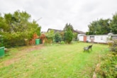 Großer Garten - DIETZ: Bungalow mit gepflegtem Garten und großer Garage und ausbaufähigem Dachgeschoss! Gute Lage!