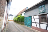 Außenansicht - Charmantes 2-3 Familienhaus mit viel Platz in Münster/Altheim – Einzelkulturdenkmal!