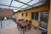 DIETZ: Modernisiertes Einfamilienhaus mit Einliegerwohnung, Garten, Hof und Garage! - Überdachte Terrasse