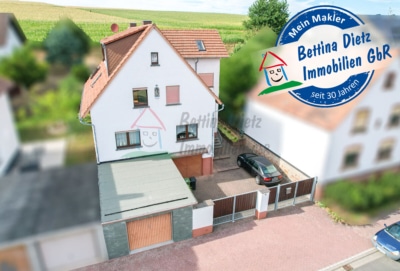 Gepflegtes 2 Familienhaus mit 2 Garagen und großem Garten in Schaafheim – Radheim! - Außenansicht (699270)