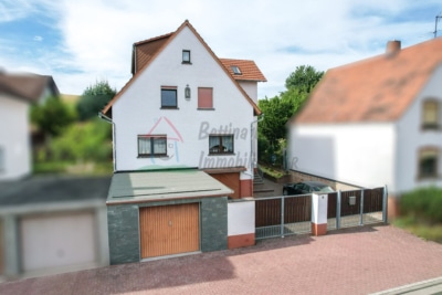 Gepflegtes 2 Familienhaus mit 2 Garagen und großem Garten in Schaafheim – Radheim! - Außenansicht (698441)