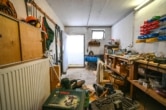 DIETZ: Tolles Einfamilienhaus mit Garten, 2 Terrassen, Doppelgarage und Keller in Großostheim! - Werkstatt unter der Garage