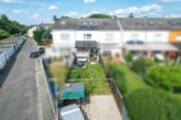 Außenansicht - Top gepflegtes RMH mit Garten, Stellplatz, Garage und Solaranlage in guter Lage von Groß-Umstadt!