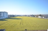 Blick vom Obergeschoss - DIETZ: GEWERBEPARK 24 – Provisionsfreie 147m² große Büro oder Lagerfläche im 1. OG mit 4m Raumhöhe!