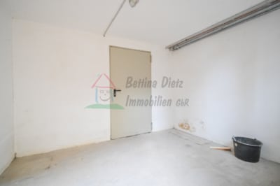 DIETZ: Gepflegte 4-Zimmer Maisonettewohnung mit 2 PKW Stellplätzen in Elsenfeld – Rück - Kellerraum (702082)