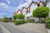 Außenansicht - DIETZ: TIP-TOP 3-Zimmer-Eigentumswohnung mit Einbauküche, Stellplatz, TGL-Bad direkt in Ringheim!