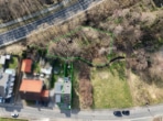 Luftbild - DIETZ: Junges Familienhaus mit 837 m² großen, idyllischen Waldgrundstück in Laufach!