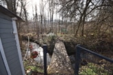 Massive Brücke - DIETZ: Junges Familienhaus mit 837 m² großen, idyllischen Waldgrundstück in Laufach!