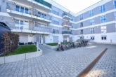 DIETZ: Moderne und helle 2-Zimmerwohnung im EG mit Balkon und TG-Stellplatz! - Außenansicht