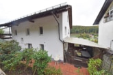 EG-Wohnung mit überdachter Terrasse - DIETZ: 2 bis 3 Familienhaus mit schönem Blick, Doppelgarage in Waldrandlage! 1 Wohneinheit frei!